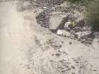 Из-за разбитой дороги в поселке Поповка сотни шахтинцев оказались отрезанными от города 
